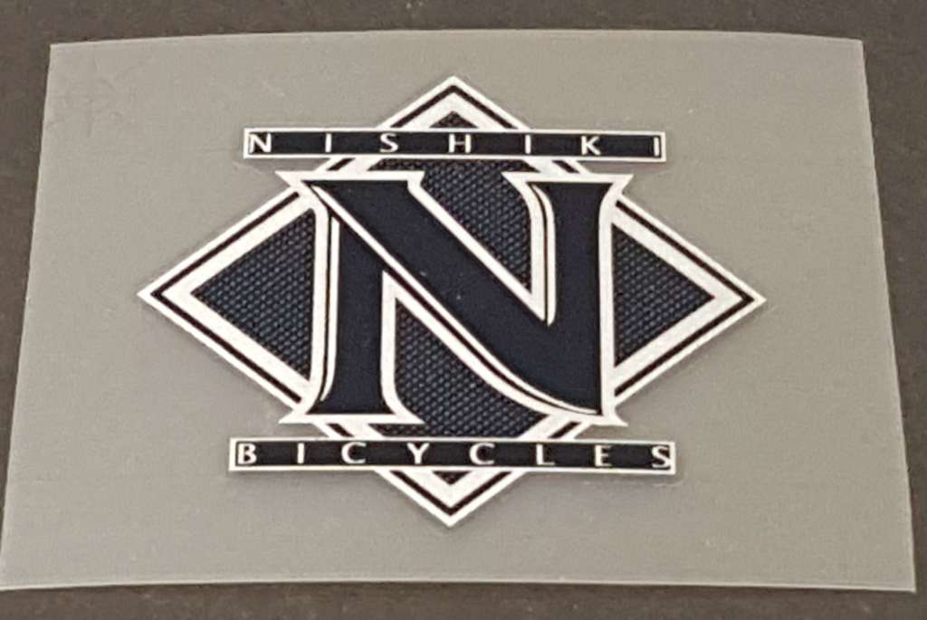 Nishiki Head badges - H Lloyd Cycles