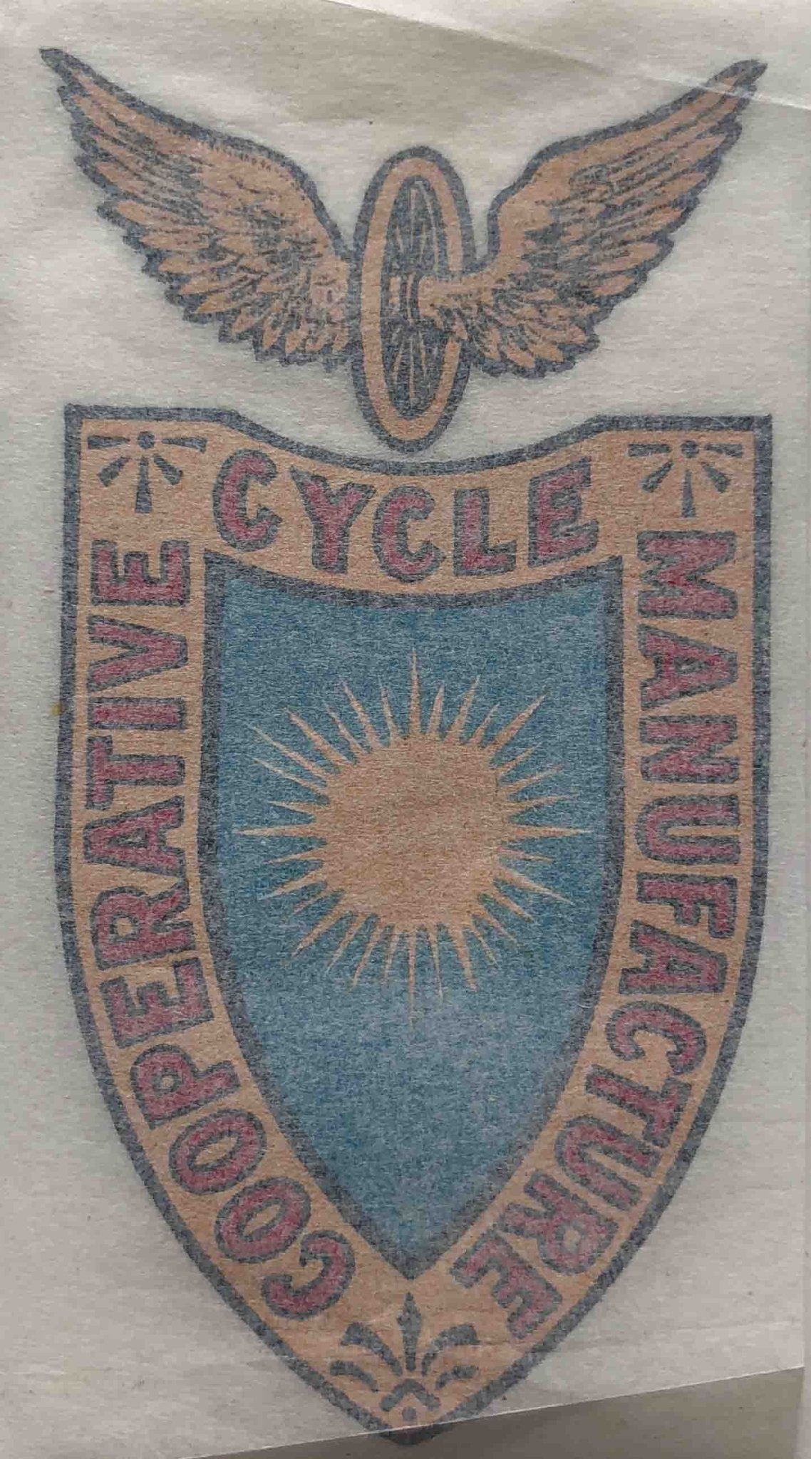 CO - OP shield with winged wheel - H Lloyd Cycles